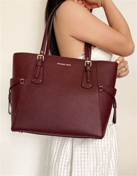 michael kors voyager tote rose gold|Michael Kors voyager tote merlot.